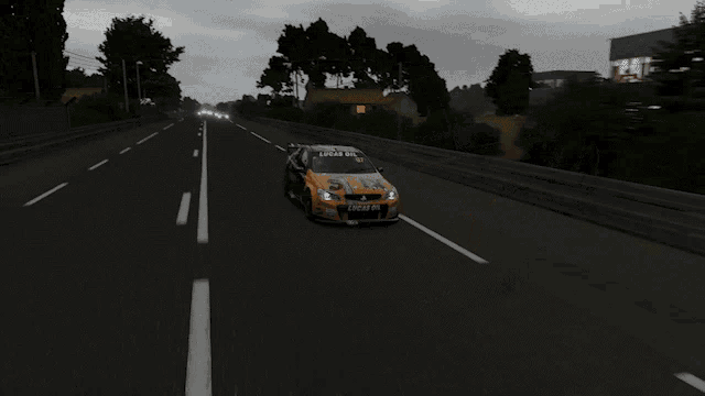 a black and orange race car with the number 97 on it