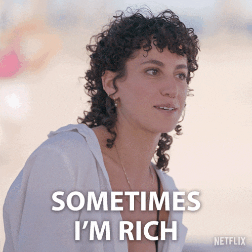 a woman with curly hair says sometimes i m rich