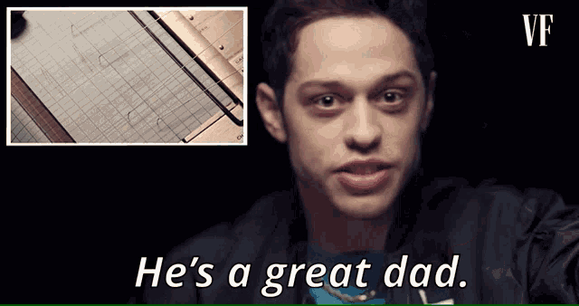a man says he 's a great dad in front of a picture of a ruler