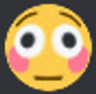 a yellow smiley face with white eyes and pink cheeks on a dark background .