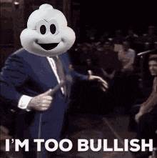 a man in a suit with a mickey mouse mask on his head says i 'm too bullish