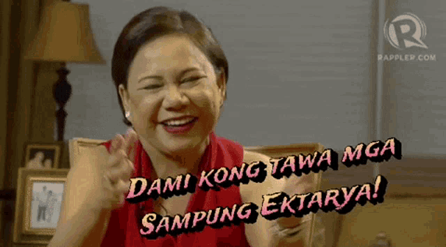 a woman in a red dress is smiling with the words dami kong tawa mga sampung ektarya written above her