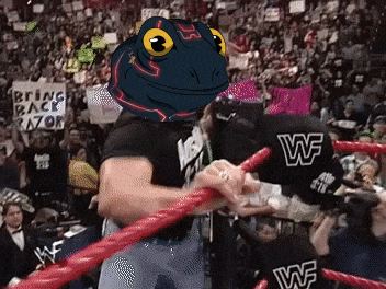 a wrestling ring with a sign that says bring back razor in the background