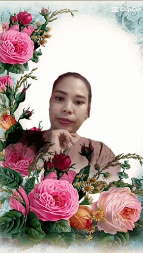 a picture of a woman surrounded by pink roses with the caption capcut on the bottom