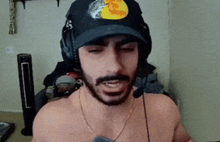 a shirtless man is wearing a bass pro shops hat