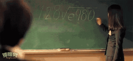 a girl is writing on a blackboard with the numbers 128