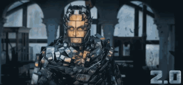 a man in a robotic suit with the number 2.0 on the bottom
