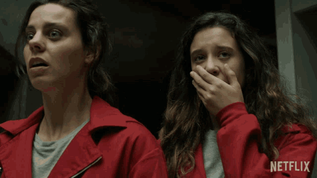 two women in red jackets with netflix written on the bottom right