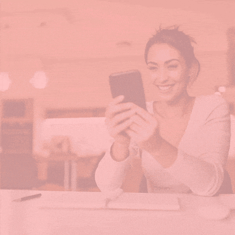 a poster that says " your mobile moment starts here " with a woman in the background