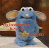a stuffed animal with the words `` my heebies are fucking jeebied '' written on it .