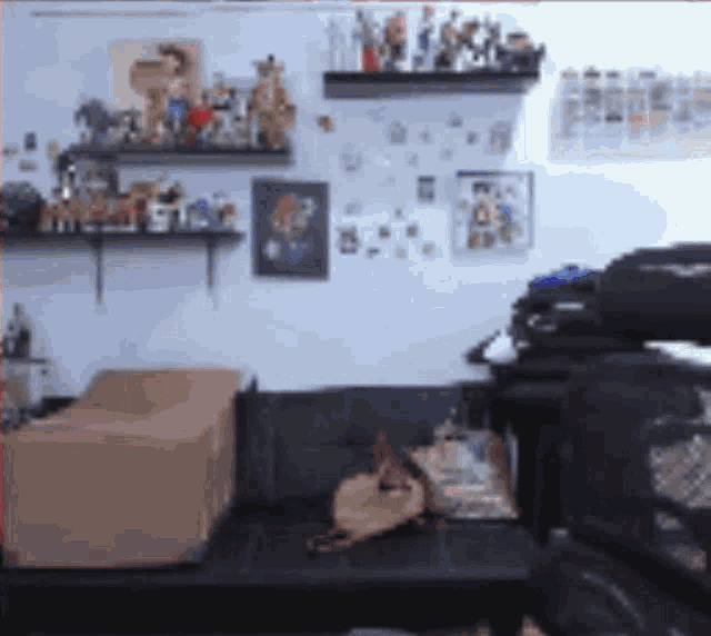 a living room with a couch and a box on the couch