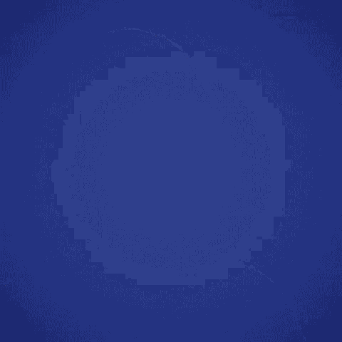 a woman in a white shirt is making a funny face against a blue background .