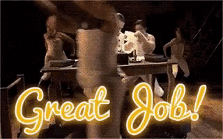 a group of people are dancing in front of a sign that says great job !