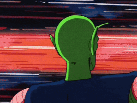 a cartoon character with a green head and ears is looking at something