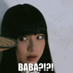 a close up of a woman 's face with the words baba ?