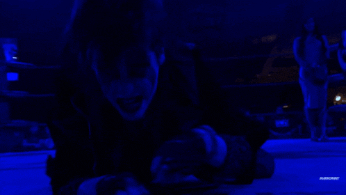 a person is laying on the floor with a blue background that says ambush