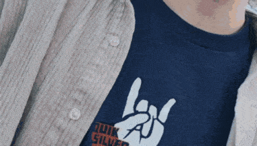 a close up of a person 's neck and shoulder