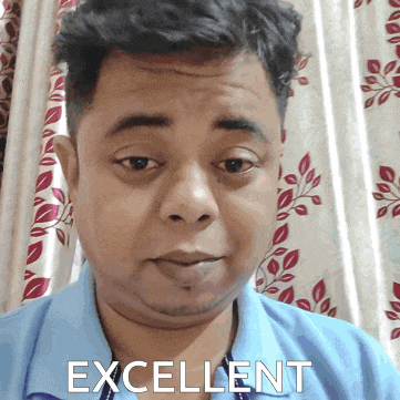 a man in a blue shirt has the word excellent written on his face