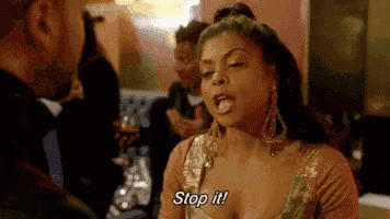 a woman is making a funny face while talking to a man and says `` stop it '' .