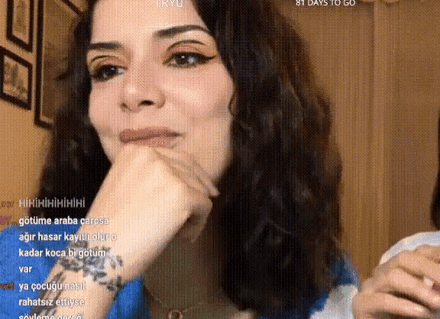 a close up of a woman 's face with the words 81 days to go in the upper right corner