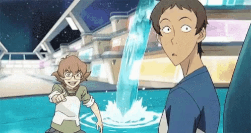 a couple of anime characters are standing next to each other in front of a waterfall .