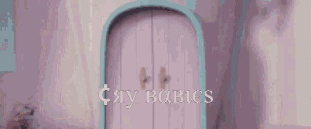 a hamster is sitting on a counter in a room with the words say babies written on it