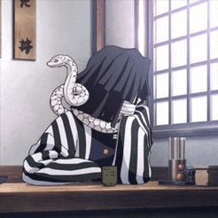 a cartoon character with a snake on his head