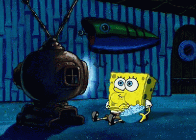 spongebob squarepants is sitting in front of a television