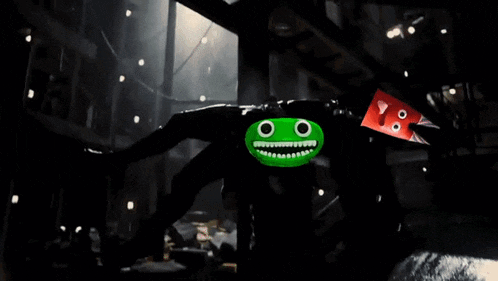 a man wearing a green mask with a smiley face