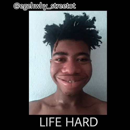 a picture of a shirtless man with a caption that reads life hard