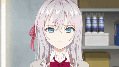 a girl with gray hair and blue eyes is looking at the camera