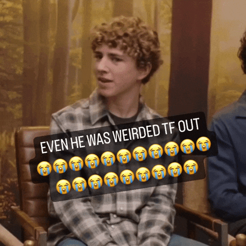 a man with curly hair is sitting in a chair with a caption that says even he was weird