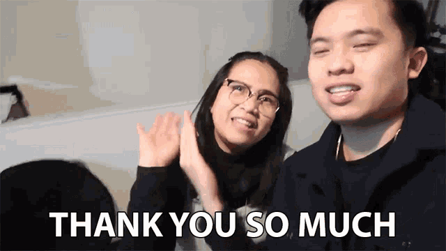 a man and a woman applauding with the words thank you so much