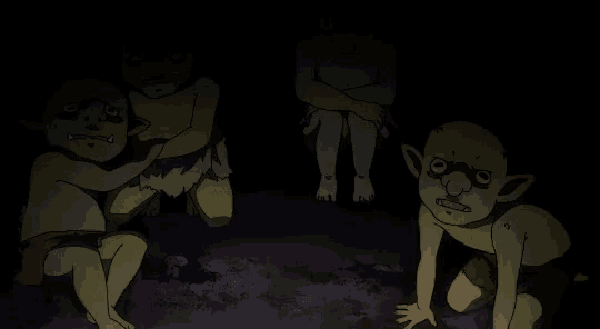 a group of goblins are sitting in the dark