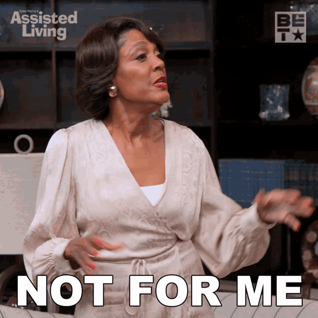 a woman says " not for me " while sitting on a couch