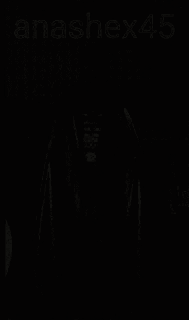 a man in a batman costume is standing in front of a car with the hashtag anashex45 on the bottom