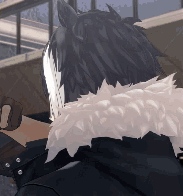 a close up of a person 's hair with a white feathered collar