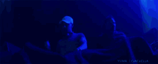 a blue background with yuma coachella written on the bottom