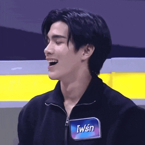 a man with a name tag that says iwsn