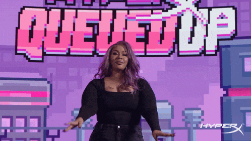 a woman with purple hair stands in front of a sign that says queueup