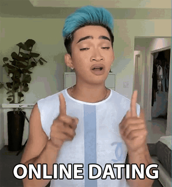 a man with blue hair is giving a thumbs up with the words online dating behind him