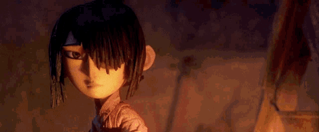 a close up of a cartoon character 's face in a dark room