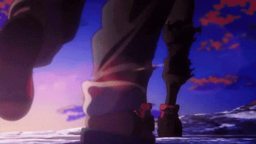 a close up of a person 's feet with a blue sky in the background .