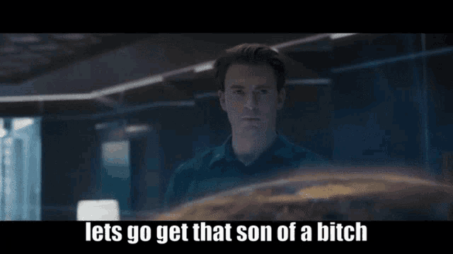 a man in a black shirt says let 's go get that son of a bitch while looking at something