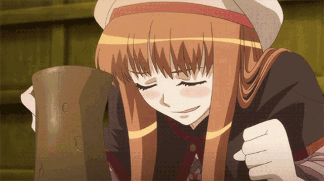 a girl with long brown hair is holding a mug with the letter c written on it