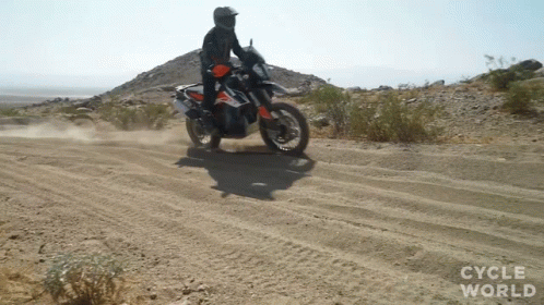 Driving Through Sand With Motorcycle Cycle World GIF - Driving Through Sand With Motorcycle Cycle World Leaving A Dust Cloud GIFs