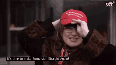 a woman wearing a red hat that says make eurovision great again on it