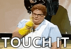 a woman wearing a yellow rubber glove is sitting on a table with the words `` touch it '' written above her .