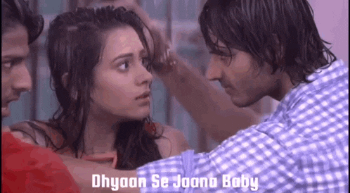a man and a woman are looking at each other and the words dhyaan se jaana baby are on the bottom