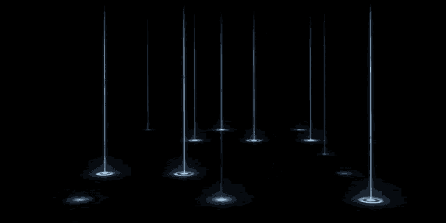a dark room with a lot of lights coming out of it